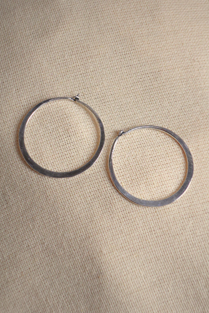 Medium Flat Hoop Earrings in Silver - Image 2